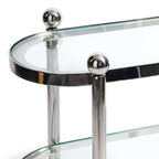 Close-up of Three-Tier Étagère showing polished silver frame and clear glass shelves.