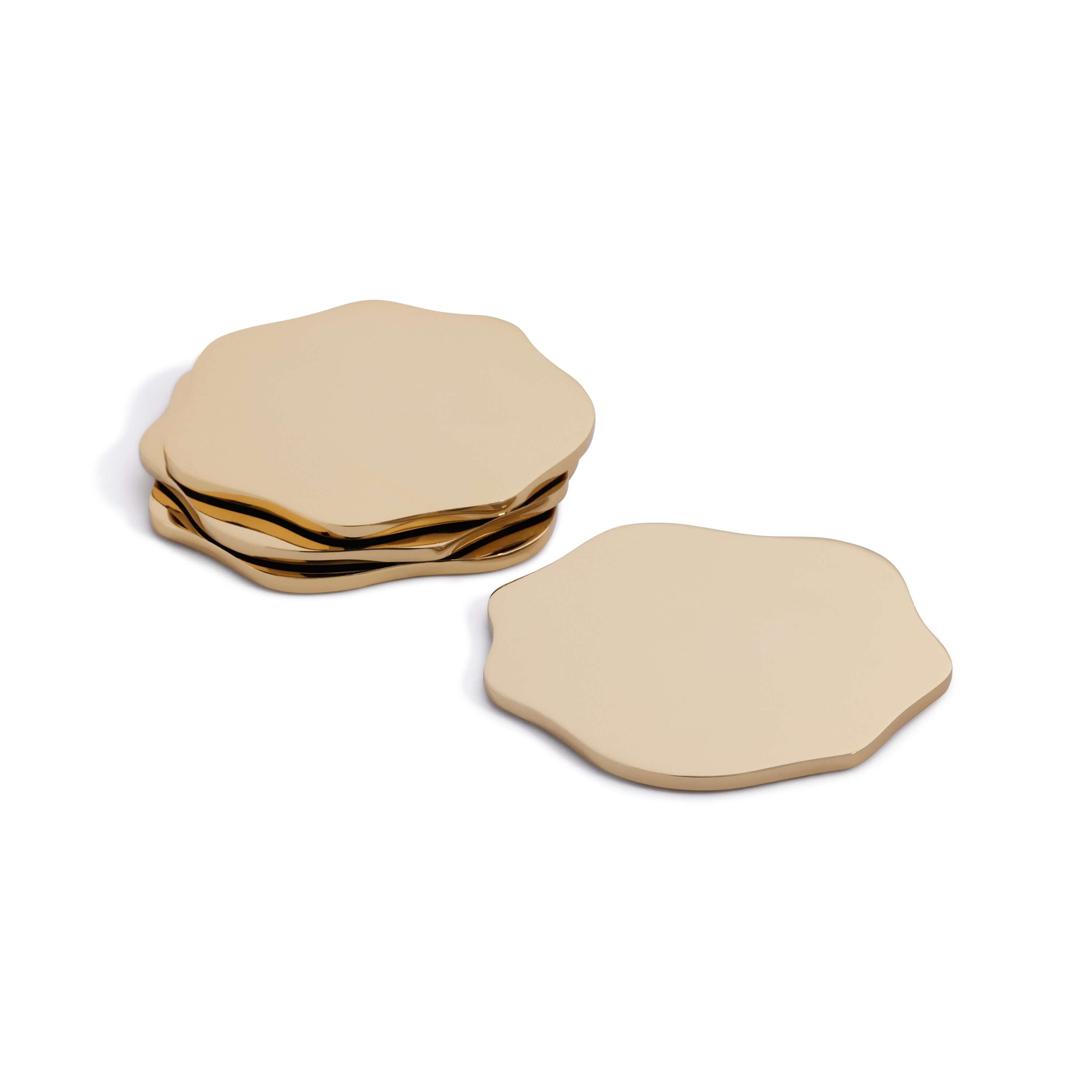 Set of gold hexagonal coasters on a white background