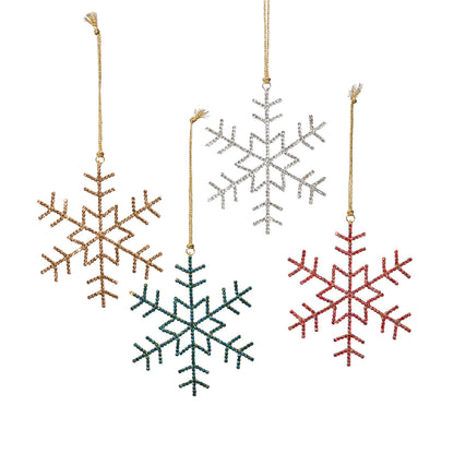 Set of four snowflake-shaped Christmas ornaments in gold, silver, green, and red on a white background.
