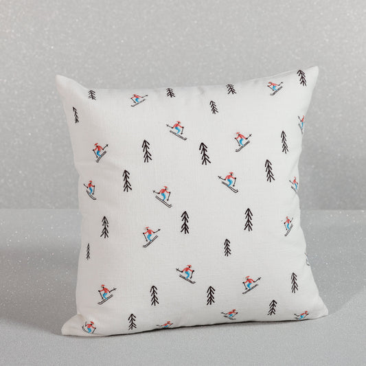 Decorative pillow with skiing pattern on a gray background