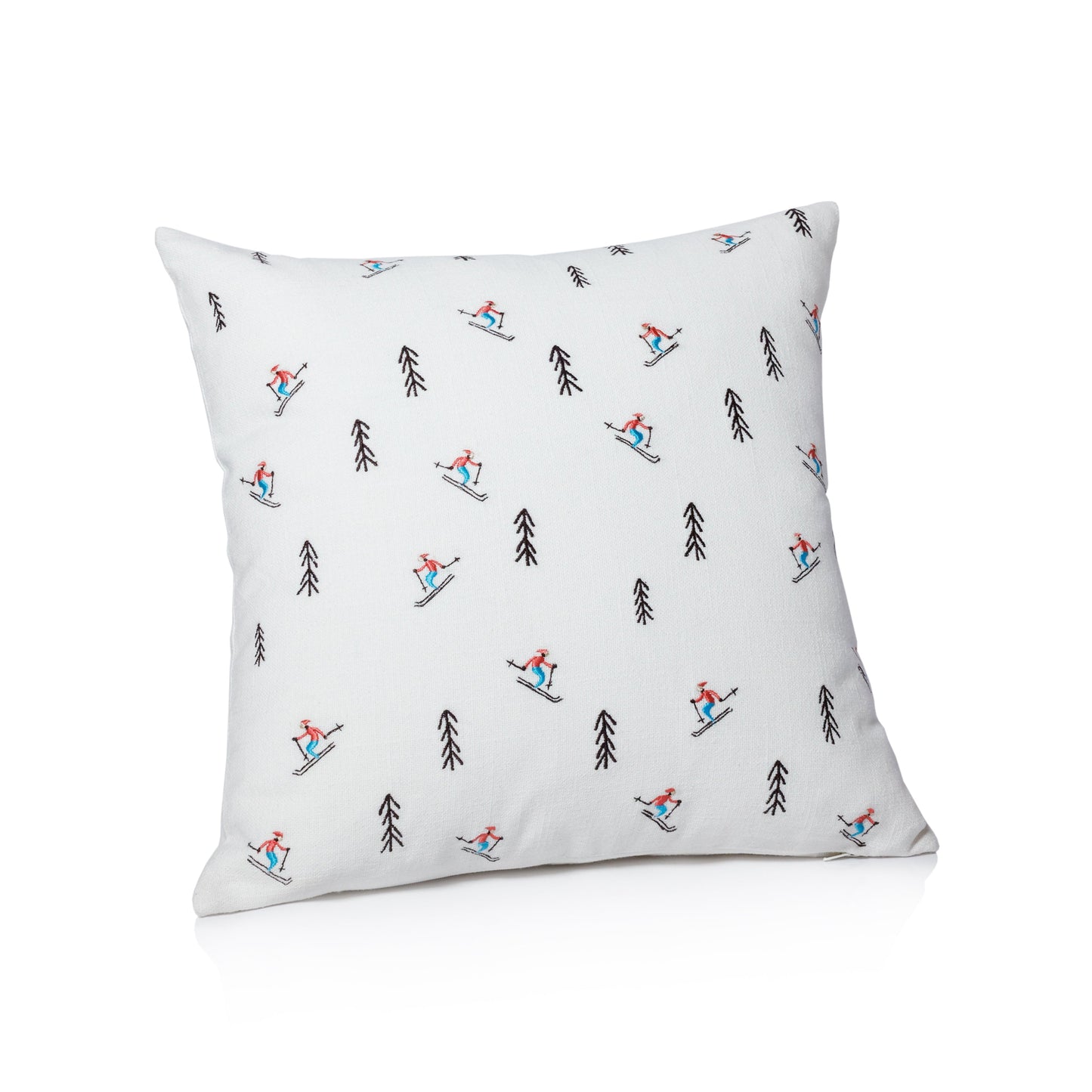 Decorative pillow with skiing pattern on a white background