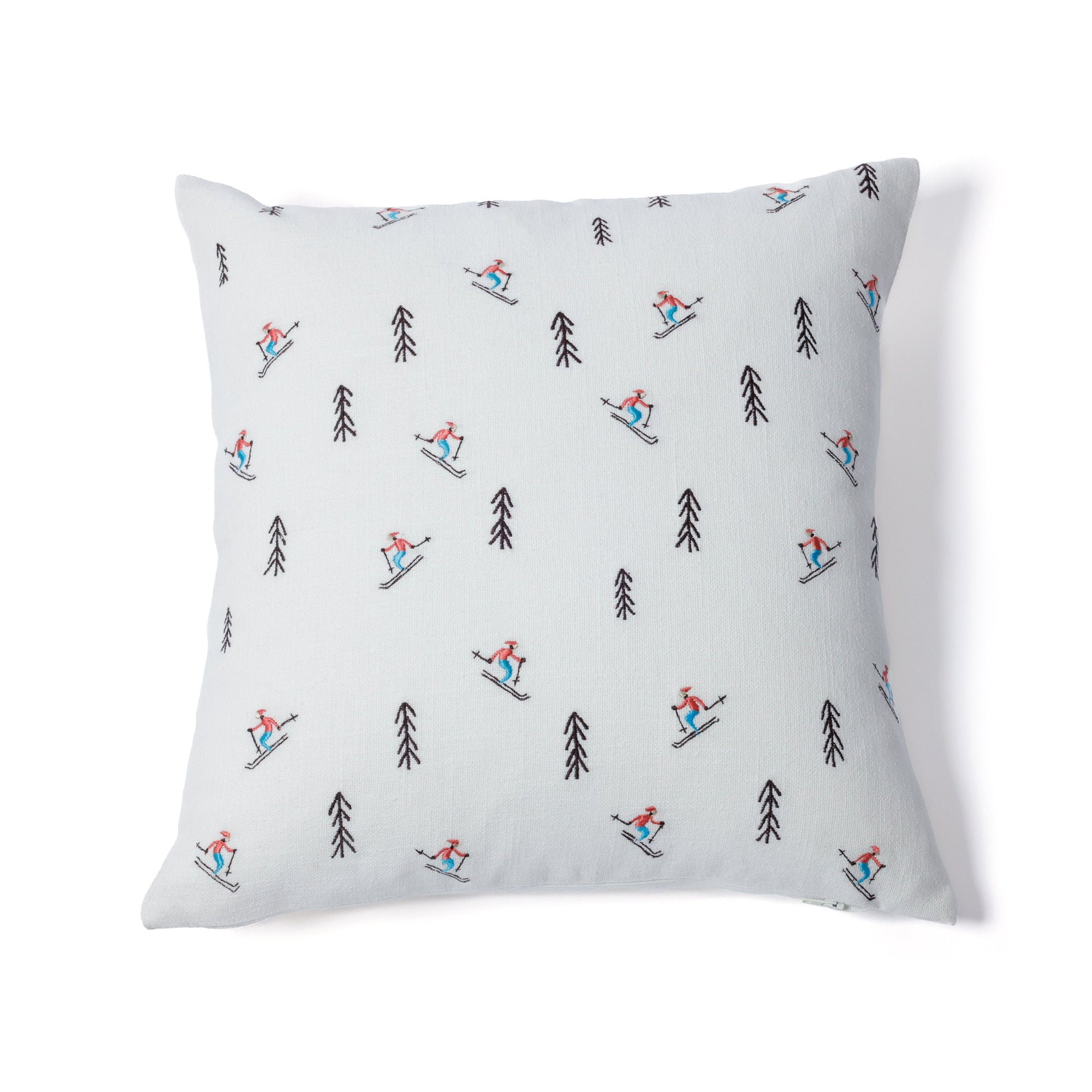 Pillow with skiing pattern on a white background