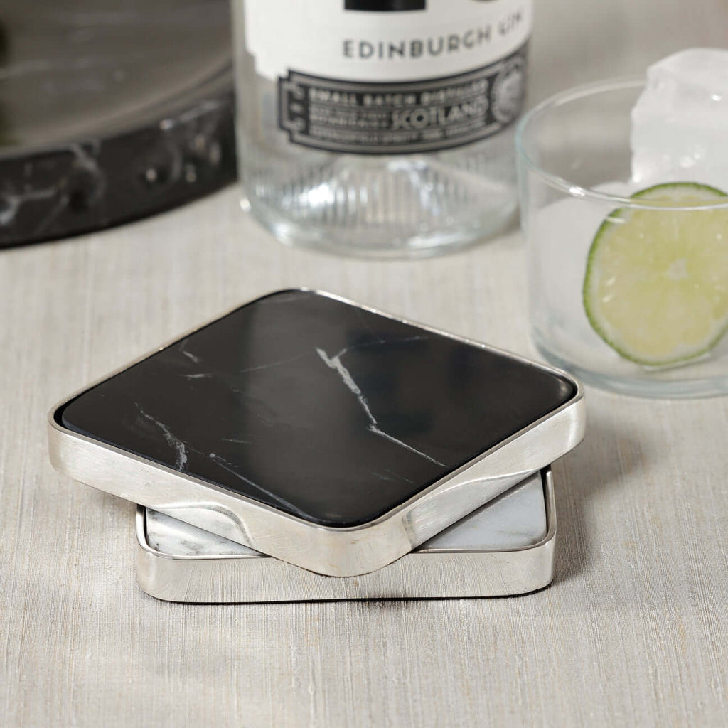Roku Silver Border Drink Coaster, Set of 6 featuring black marble and polished silver border.