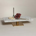 Bodega Cheese and Charcuterie Marble Serving Tray with cheese, grapes, and gold utensils on a table.