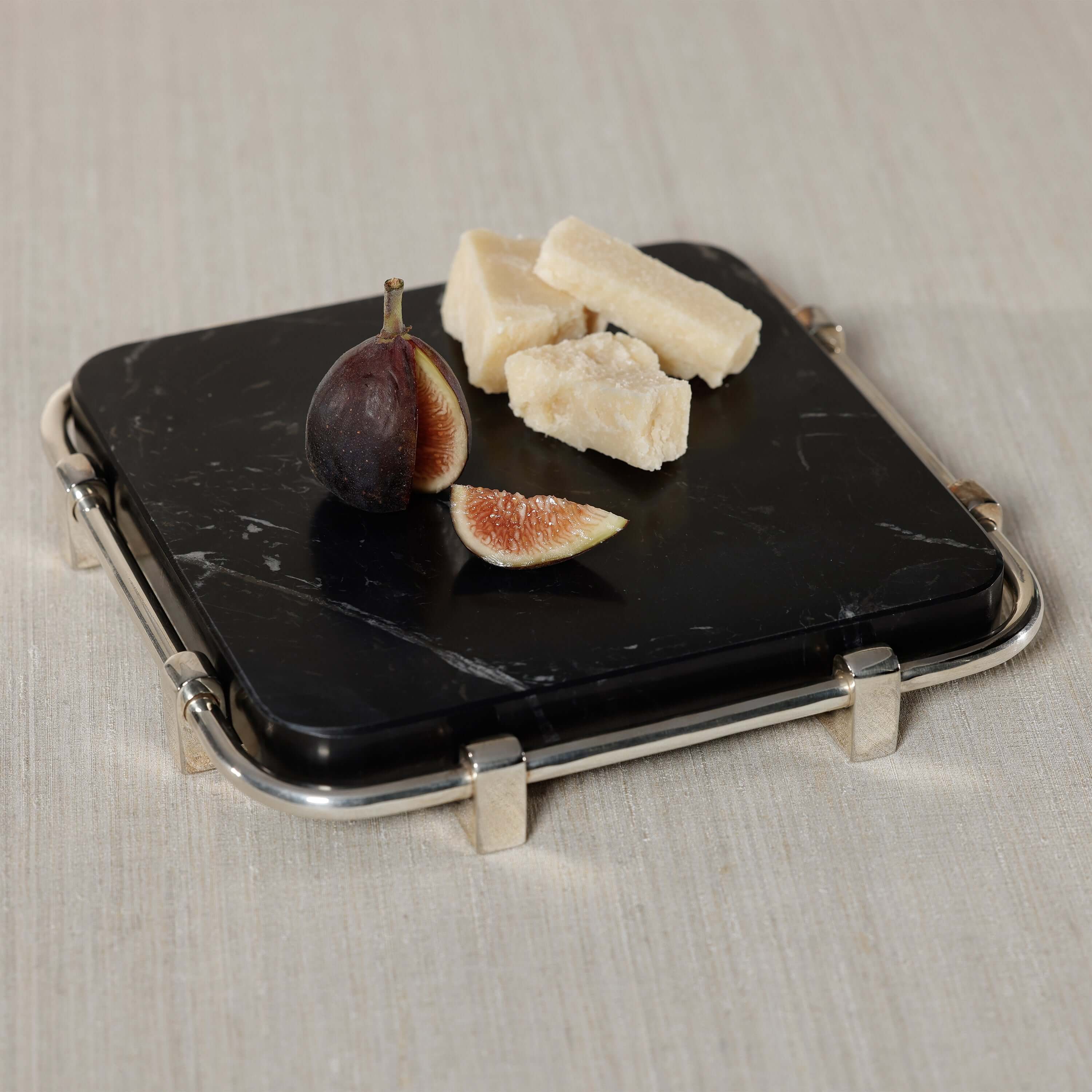 Ombra Cheese and Charcuterie Marble Serving Tray with figs and cheese on a polished nickel frame.