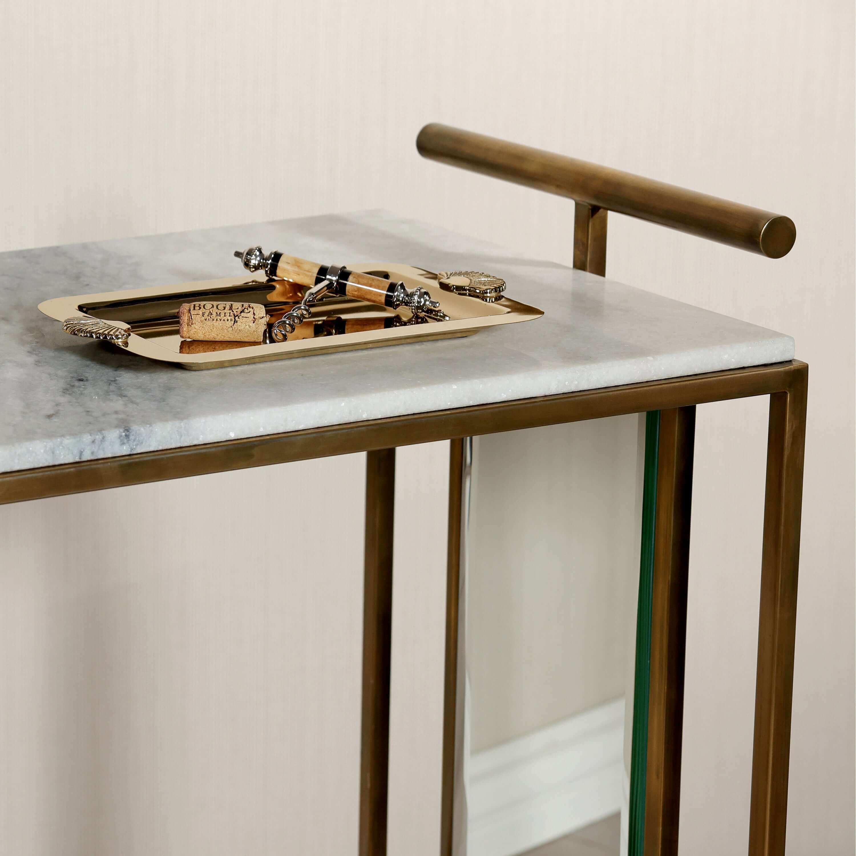 Soho Marble Bar Cart featuring a brass tray and marble top, perfect for stylish home entertaining.
