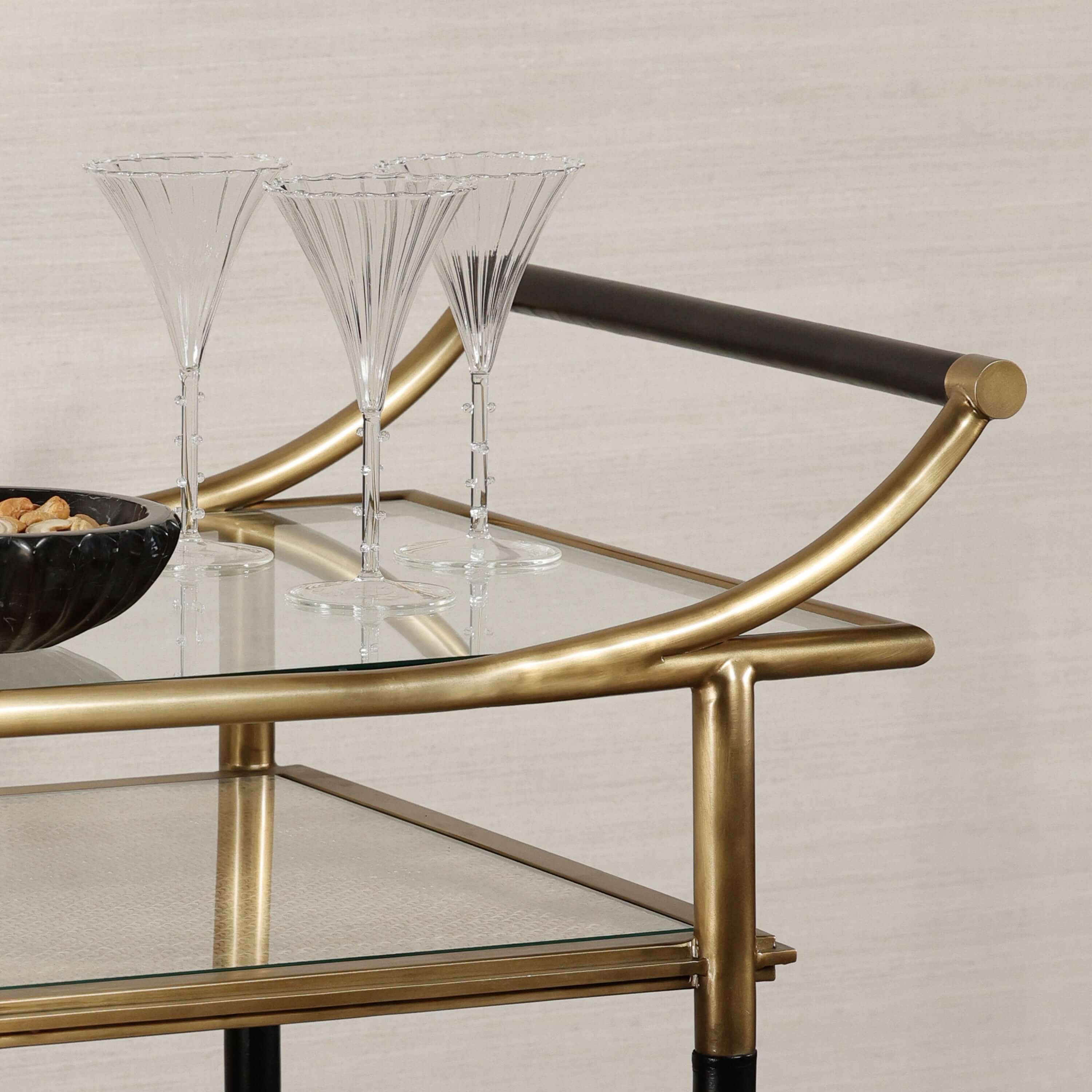 Mayfair 59 Bar Cart featuring an antique brass frame and elegant glassware for stylish entertaining.