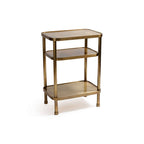 Aman Étagère, a three-tier open shelving table in warm antique brass, perfect for stylish storage.