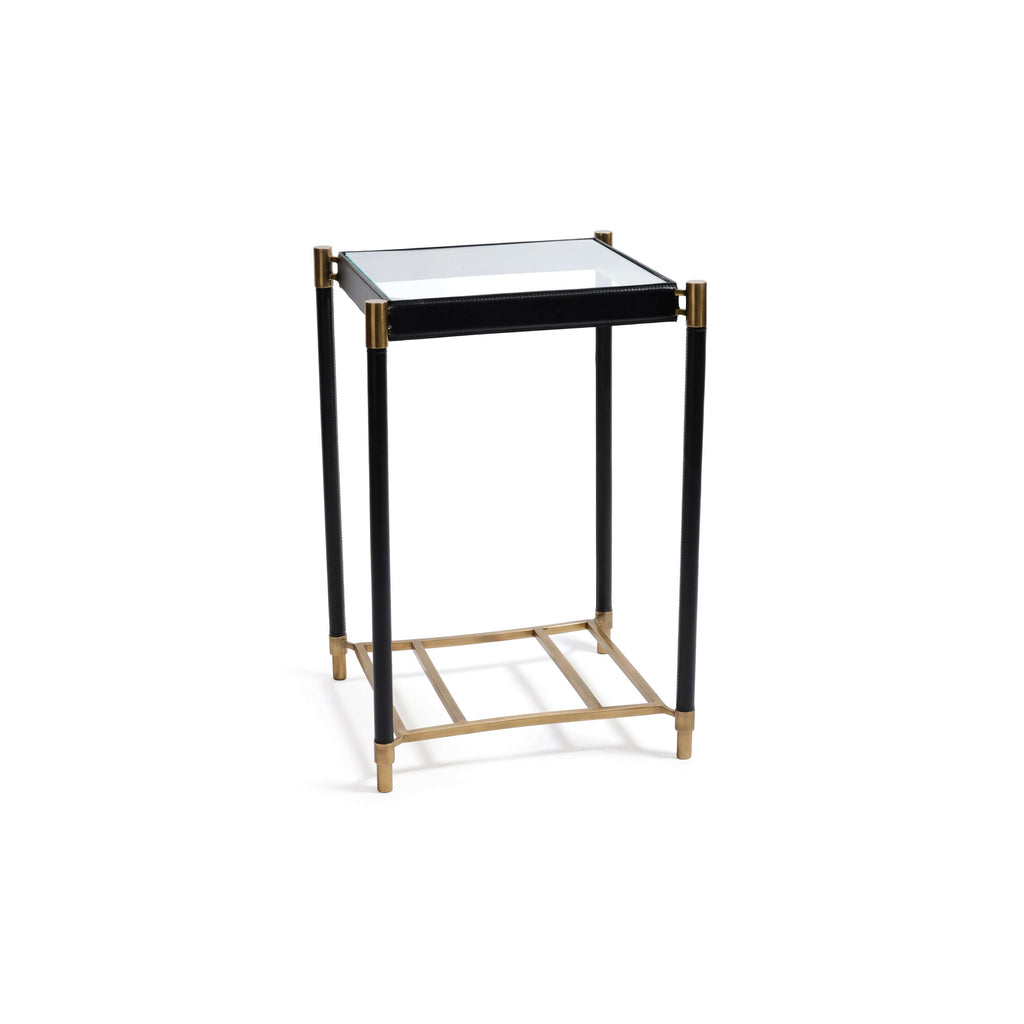 Park Lane 18 Leather Side Table featuring a glass top, black leather legs, and brass accents.