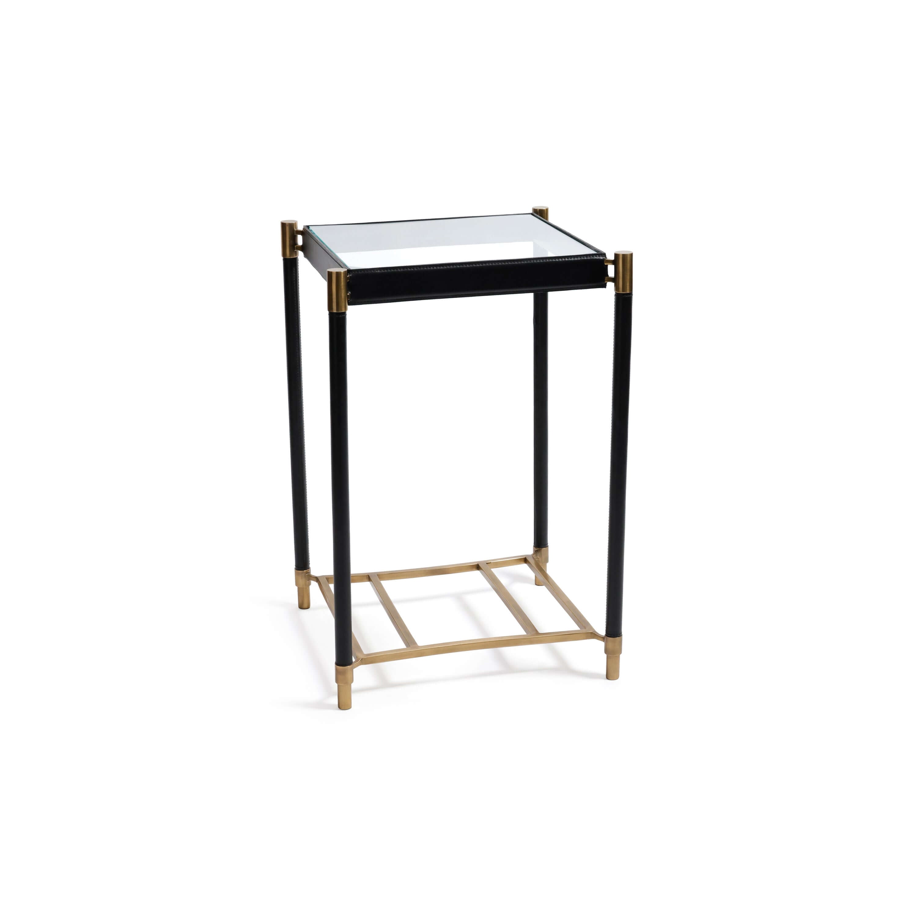 Park Lane 18 Leather Side Table featuring a glass top, black leather legs, and brass accents.