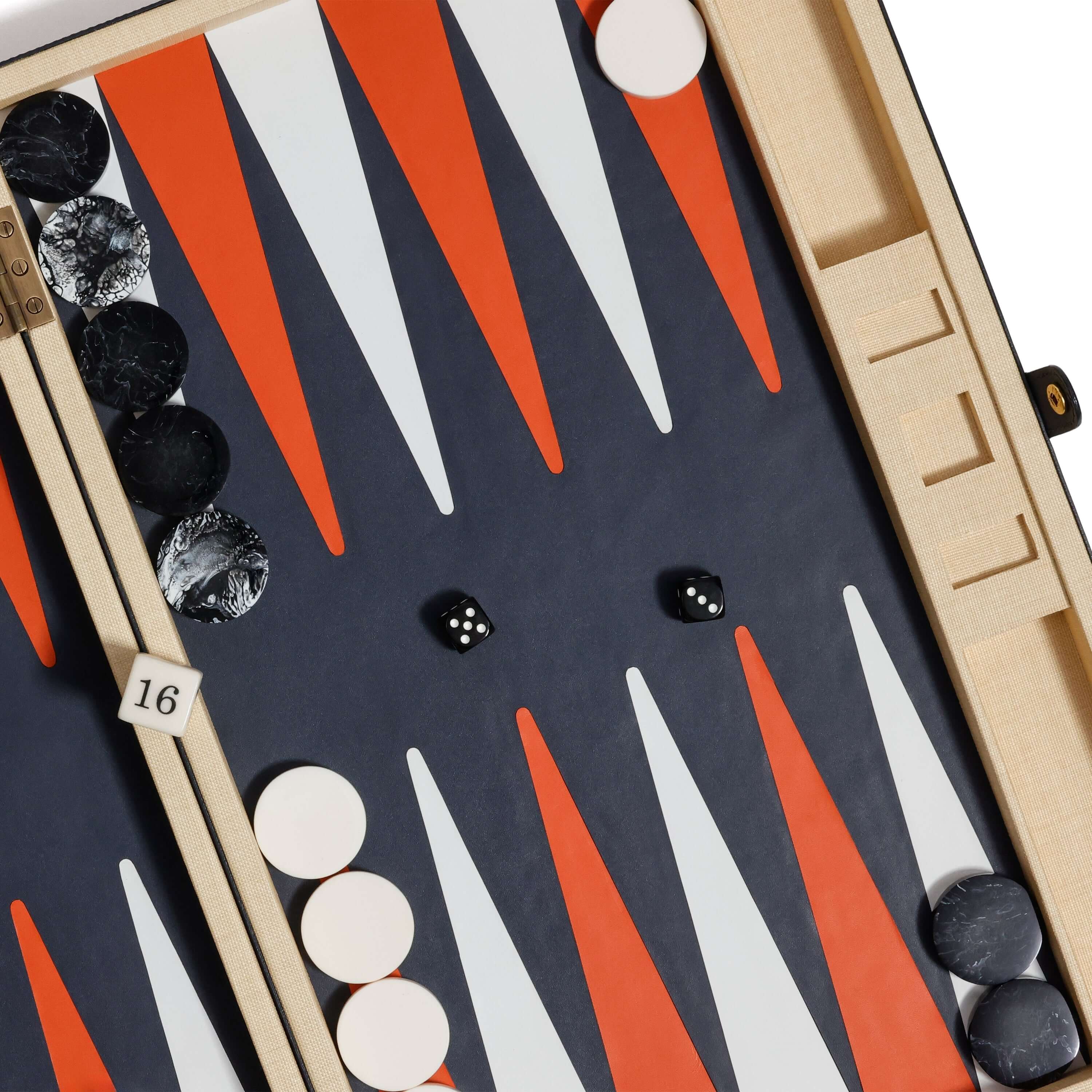 Monaco 19" Backgammon Set featuring a vibrant playing field with burnt orange and white points, black and white checkers.