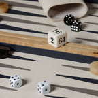 Marbella Backgammon Set with dice and game pieces on a stylish board.