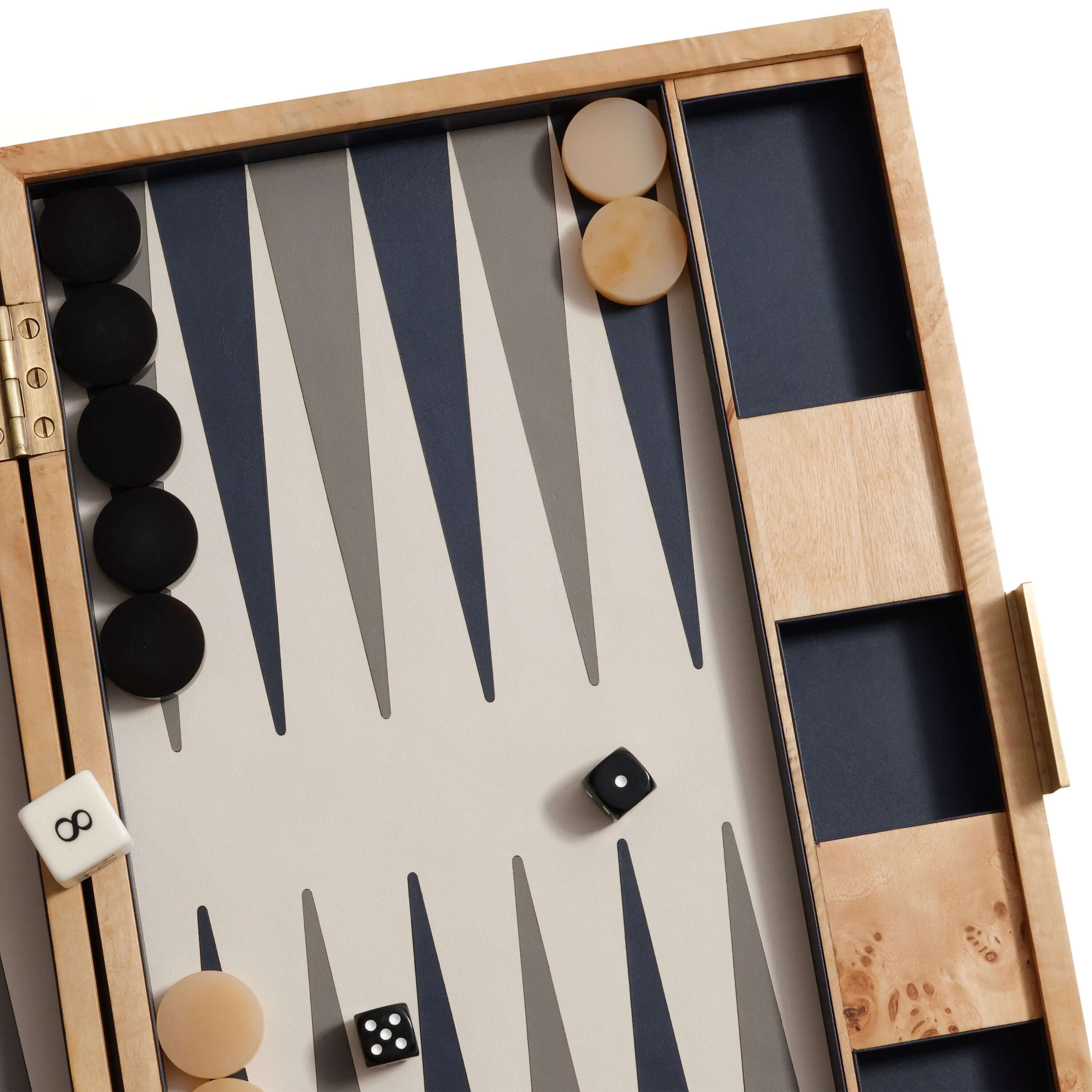 Marbella Backgammon Set featuring a burl wood veneer case with elegant game pieces on a stylish board.