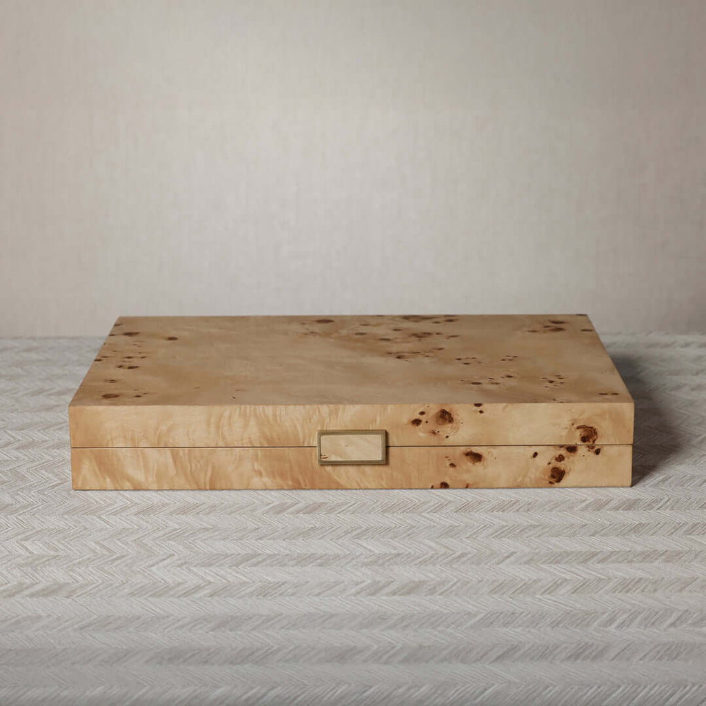 Marbella Backgammon Set in burl wood veneer showcasing warm honey and amber grain pattern.