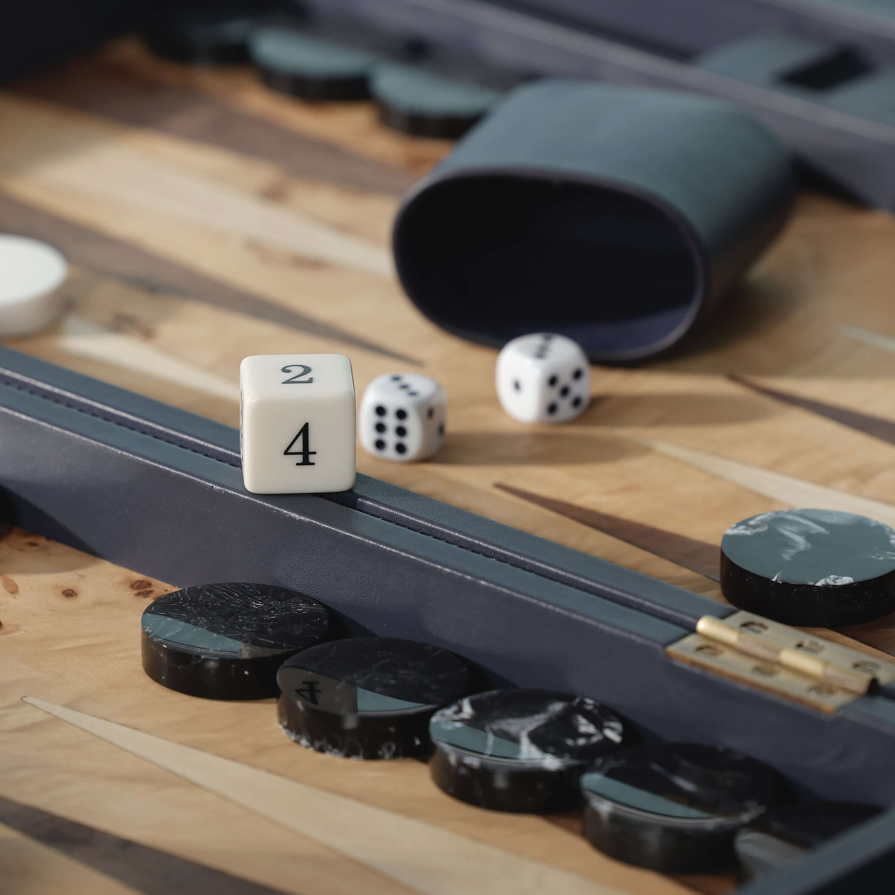 Geneva 19" Backgammon Set - Marine Blue Leather with dice and game pieces on a stylish board.