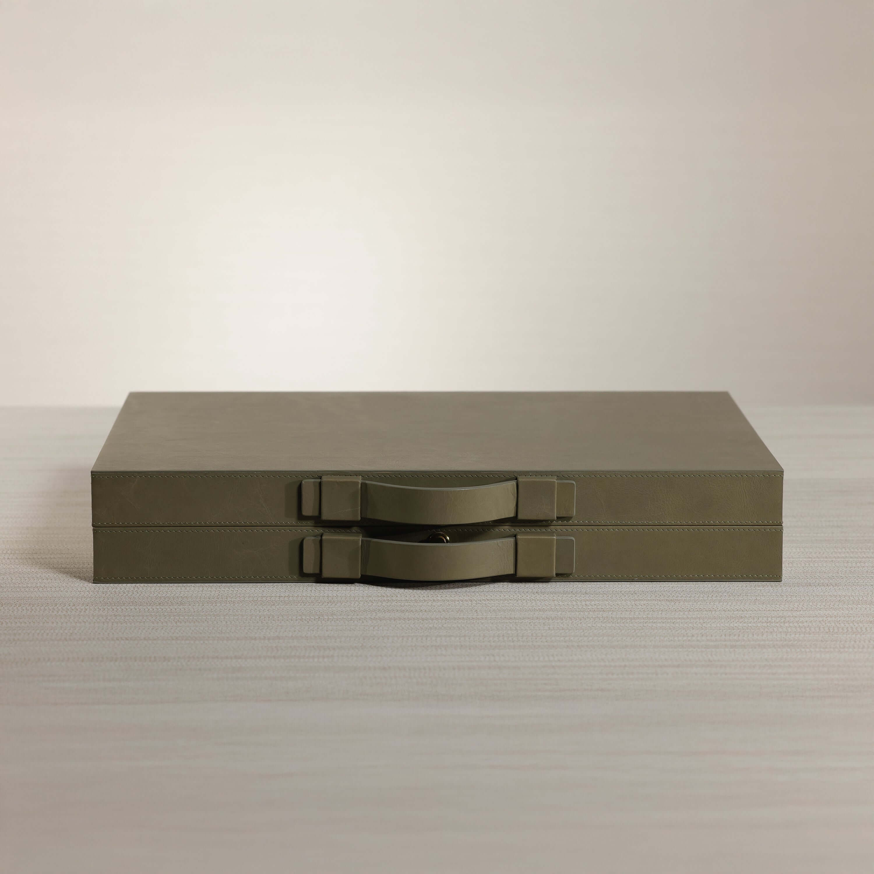Geneva 19" Backgammon Set - Dusty Green Leather elegant attaché style case with smooth sage leather exterior.