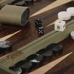 Geneva 19" Backgammon Set - Dusty Green Leather with game pieces and dice on a luxury wooden board.