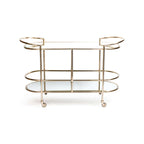 Stylish Lido Console Bar Cart featuring a champagne brass frame and glass shelves, perfect for entertaining.