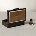 The Langham Box with dark espresso wood veneer, showcasing its smooth lacquered finish and elegance.
