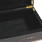 The Corinthia Box interior view showcasing black shagreen texture and gold hinges.