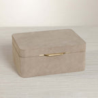 Linea Suede Jewelry Box in soft taupe suede with brushed brass hardware, perfect for elegant jewelry storage.