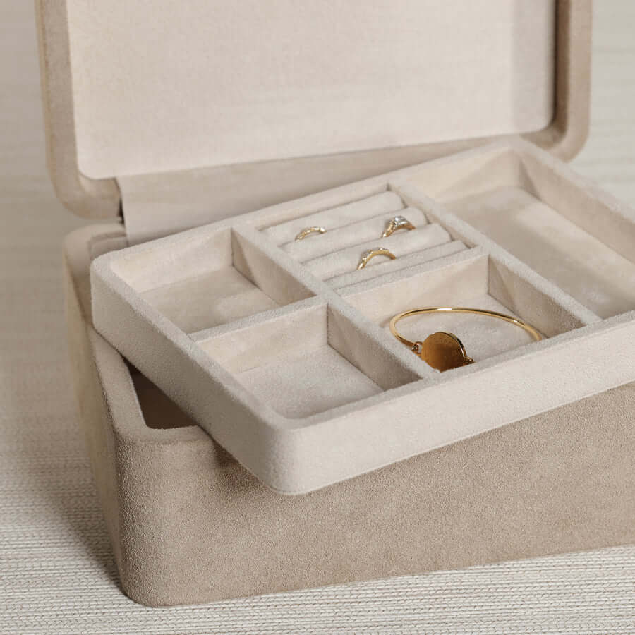 Linea Suede Jewelry Box interior with multi-compartment tray for organized jewelry storage.