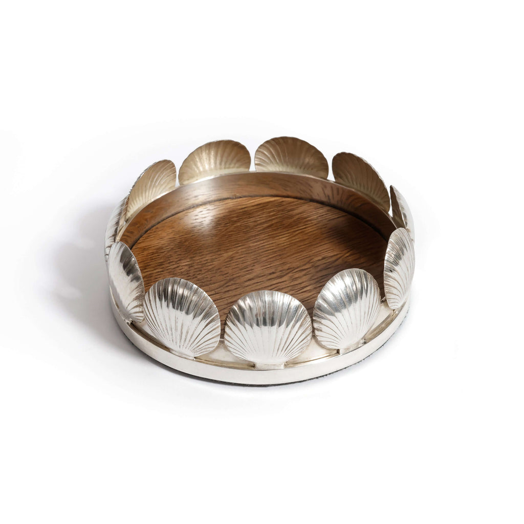 Sur Mer Shell Design Bottle Coaster featuring a decorative shell motif and polished metal finish for coastal elegance.
