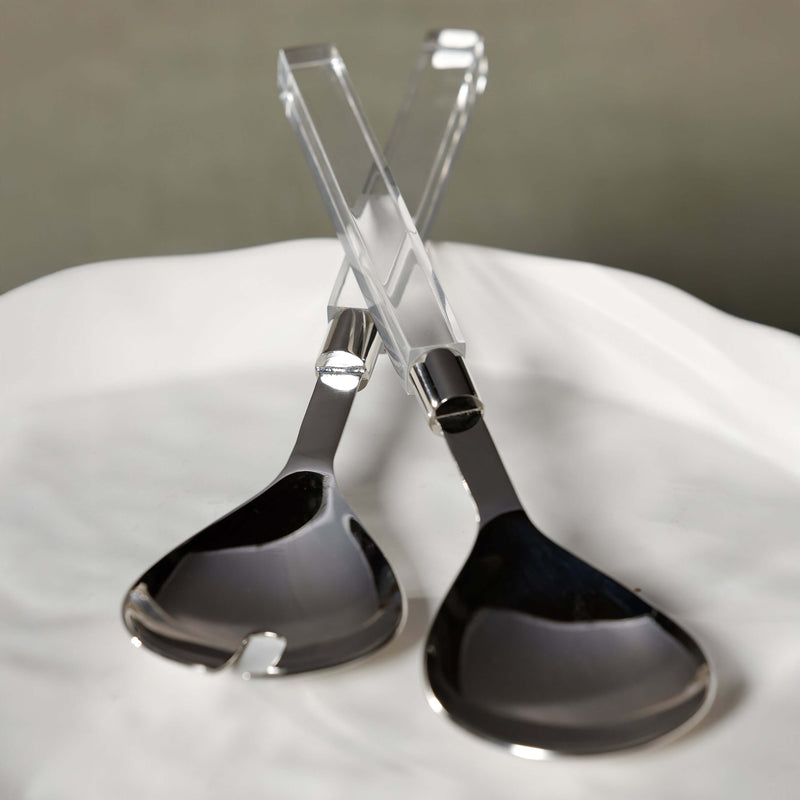 Mougins Salad Server Set with Acrylic Handle features polished stainless serving heads and crystal-clear handles.