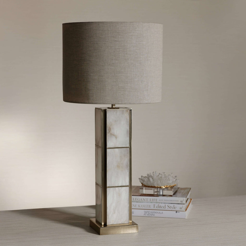 Golden Shore Alabaster Table Lamp featuring a unique alabaster base and a soft fabric shade, perfect for elegant interiors.