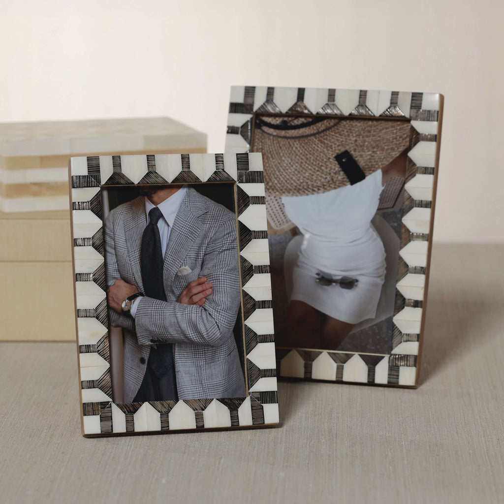 Lagos White Bone & Chiseled Horn Inlaid Photo Frame displaying stylish photographs.