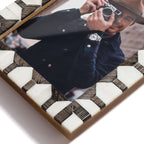 Lagos White Bone & Chiseled Horn Inlaid Photo Frame with geometric design and photo of a person holding a camera.