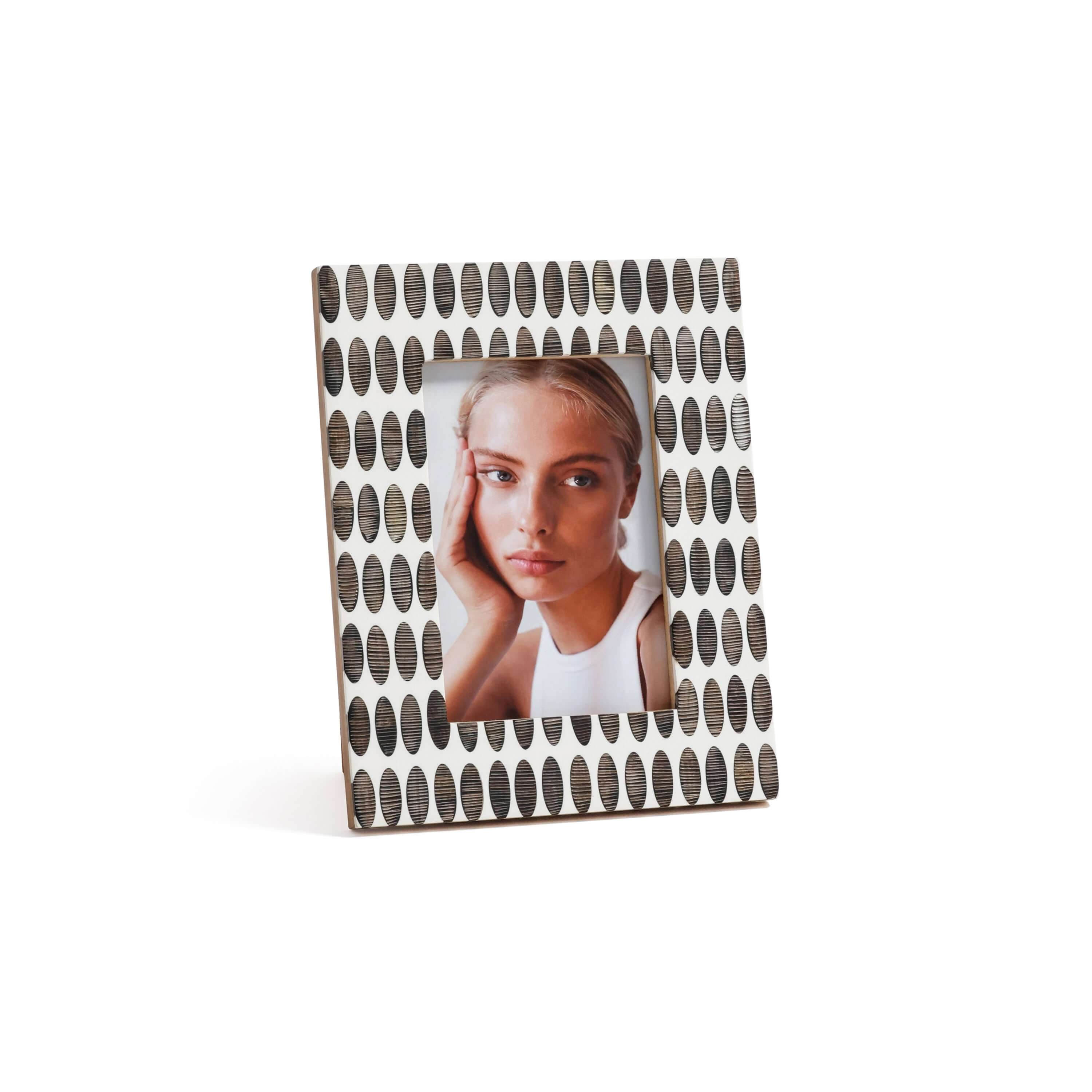 Sahara White Resin with Oval Chiseled Horn Photo Frame displayed with an image of a woman.
