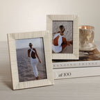 Nubia White Bone Ribbed Photo Frame displaying two elegant images on a styled table with a candle.