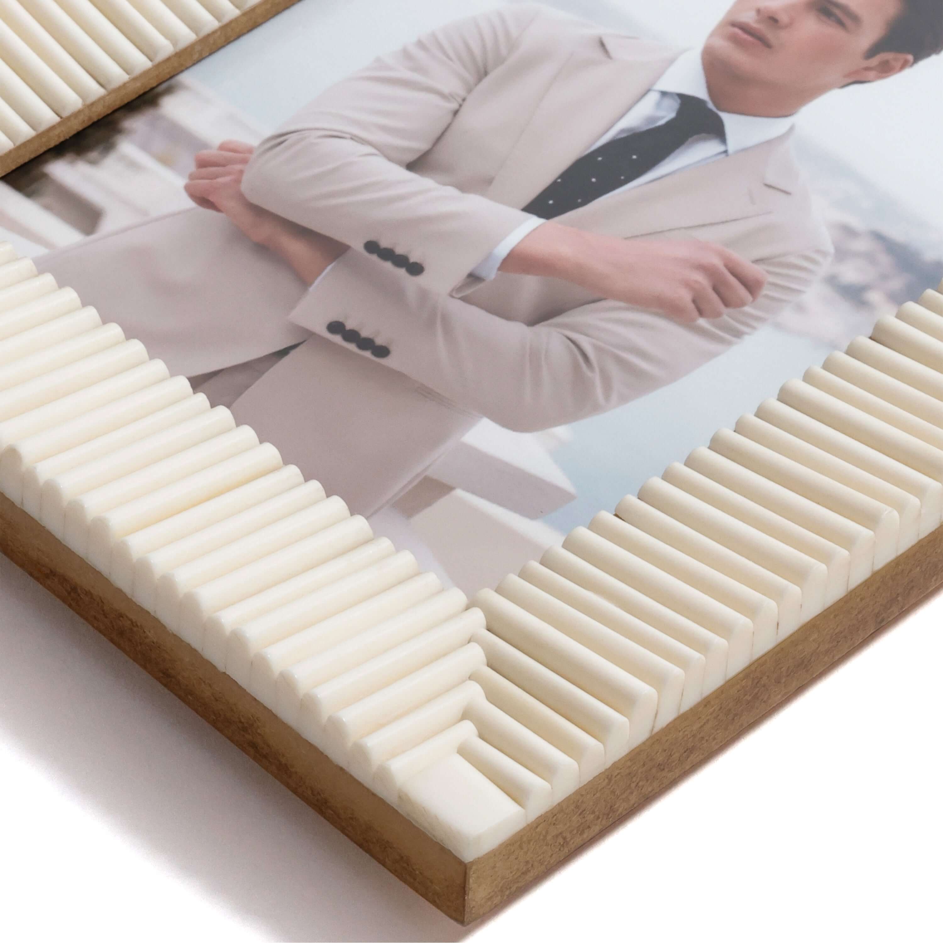 Nubia White Bone Ribbed Photo Frame showcasing elegant hand-carved white bone and fine parallel ribbing.