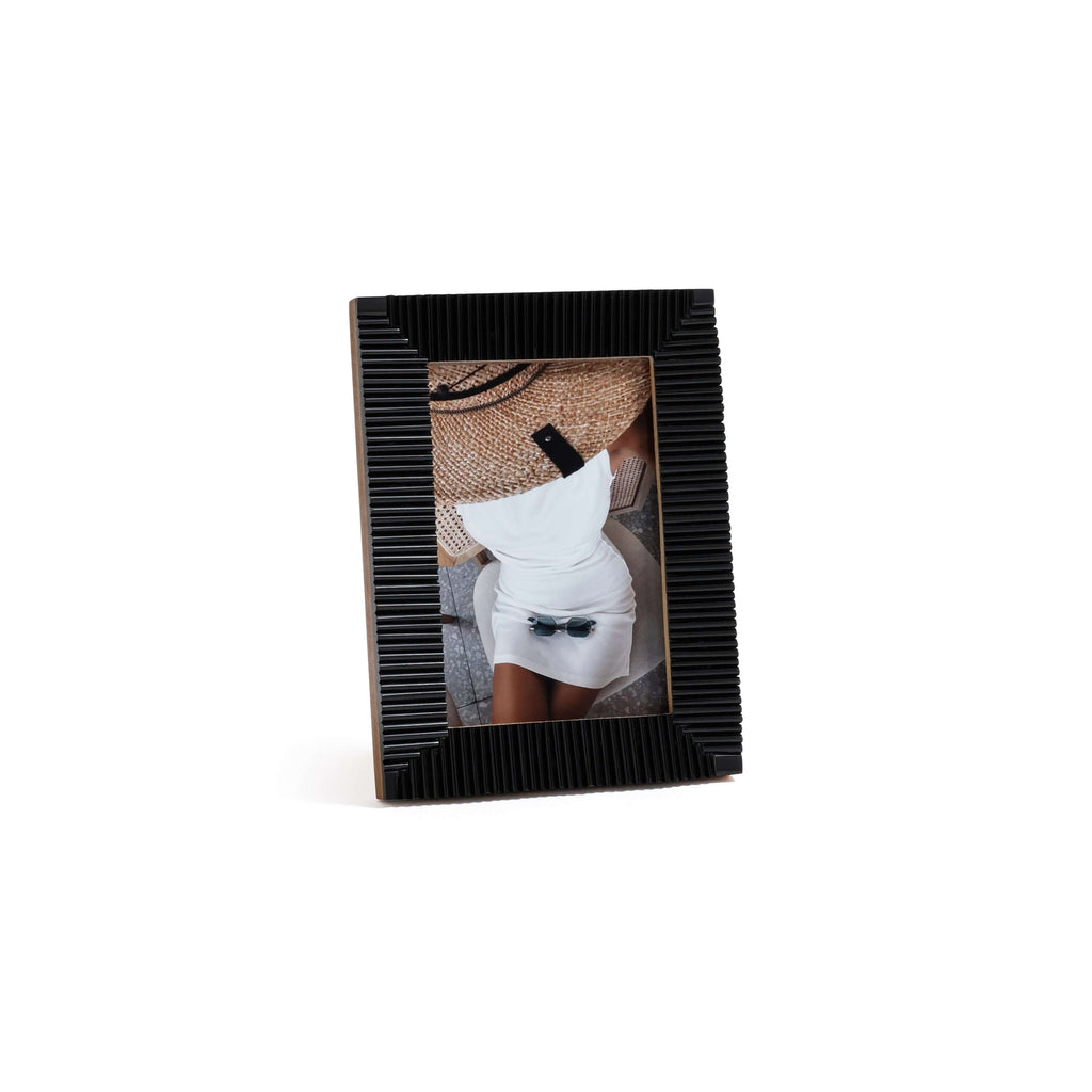 Nubia Black Bone Ribbed Photo Frame displaying a stylish photo with hand-carved parallel ribbing detail.