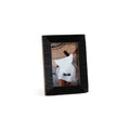 Nubia Black Bone Ribbed Photo Frame displaying a stylish photo with hand-carved parallel ribbing detail.