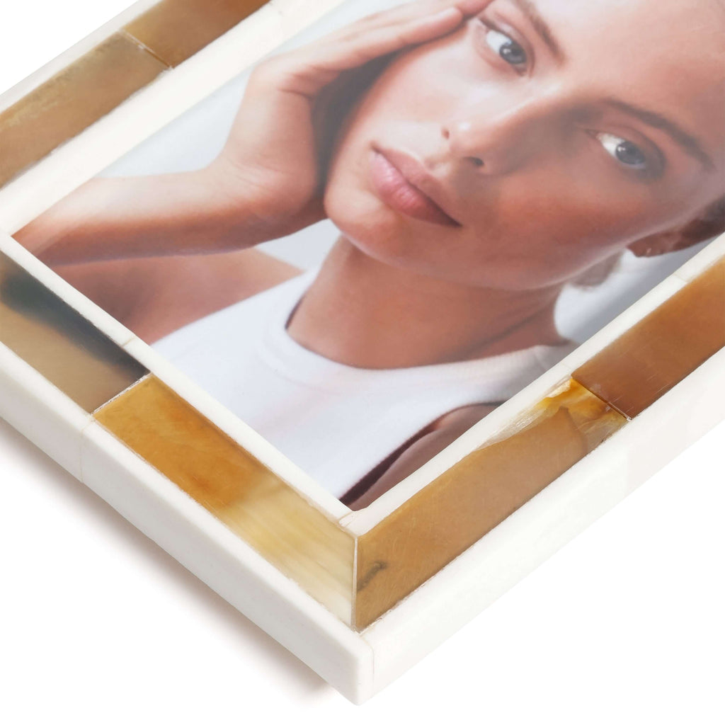 Haven Brown Horn with White Bone Border Photo Frame showcasing natural horn and ivory resin details.
