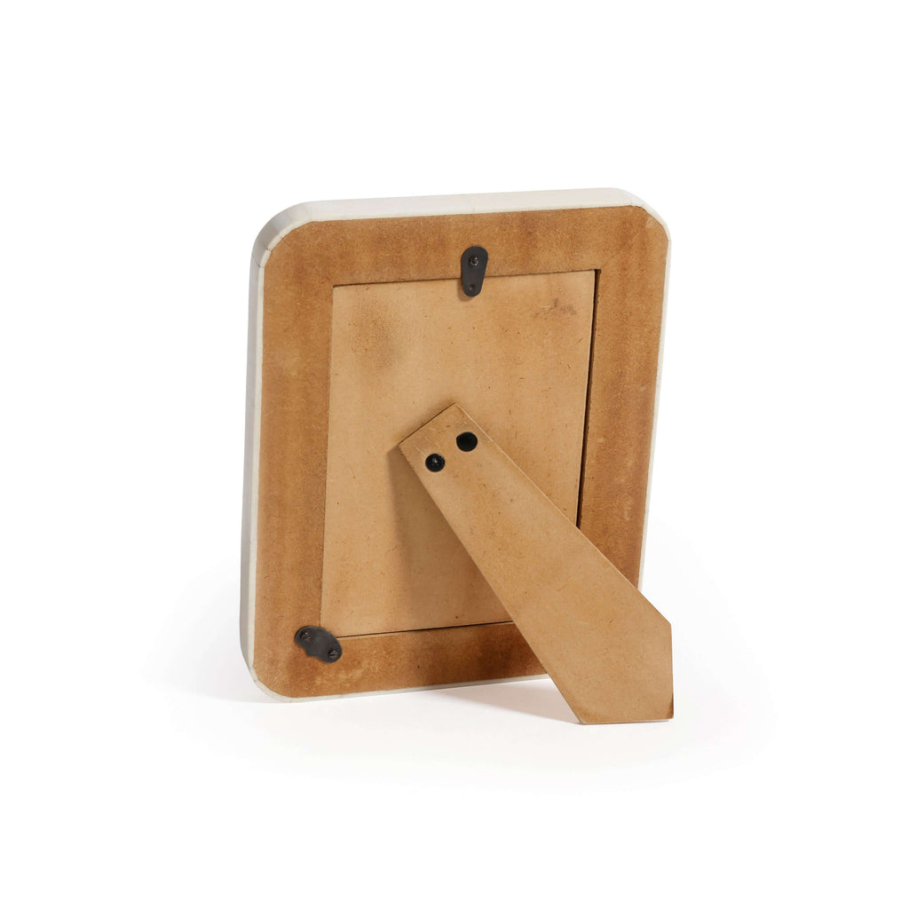 Wooden picture frame with a stand on a white background