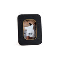 Black Resin Ribbed Photo Frame with Brass Accent showcasing a photo with a stylish outfit and accessories.