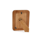 Black Resin Ribbed Photo Frame with Brass Accent back view showing stand and mounting clips.