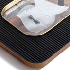 Black Resin Ribbed Photo Frame with Brass Accent featuring textured surface and rounded edges.