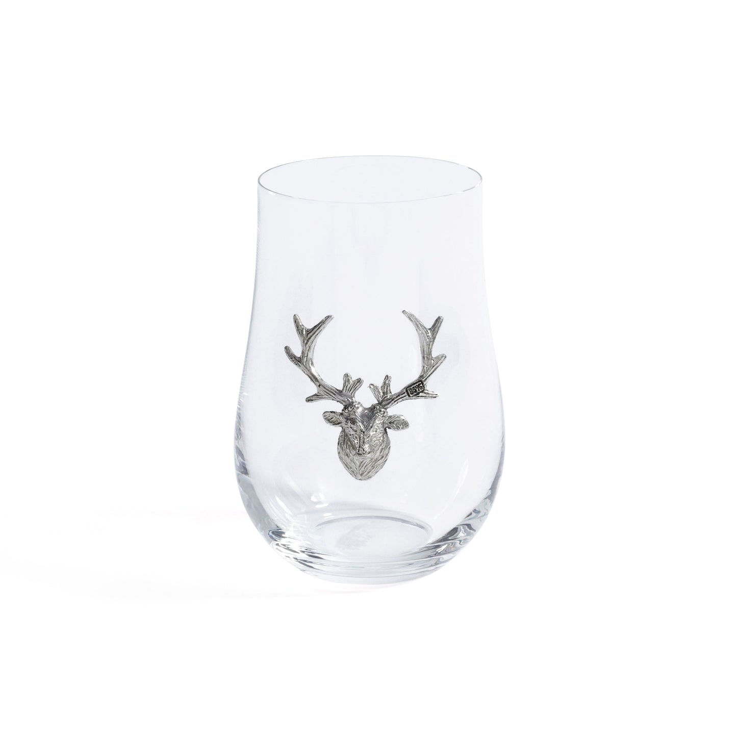 Clear glass with a silver deer head emblem on a white background