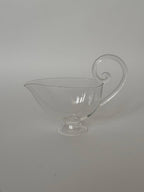 Sauciere, Clear decorative glass pourer for sauces, perfect for table settings and serving dishes.