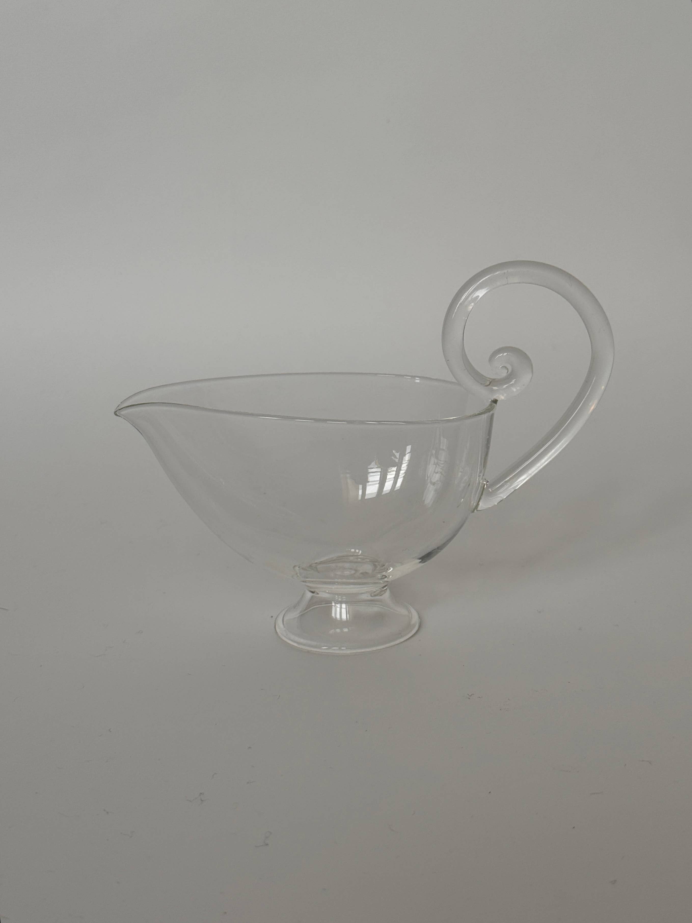 Sauciere, Clear decorative glass pourer for sauces, perfect for table settings and serving dishes.