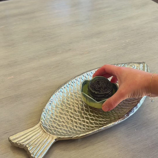 caviar and chips on fish platter